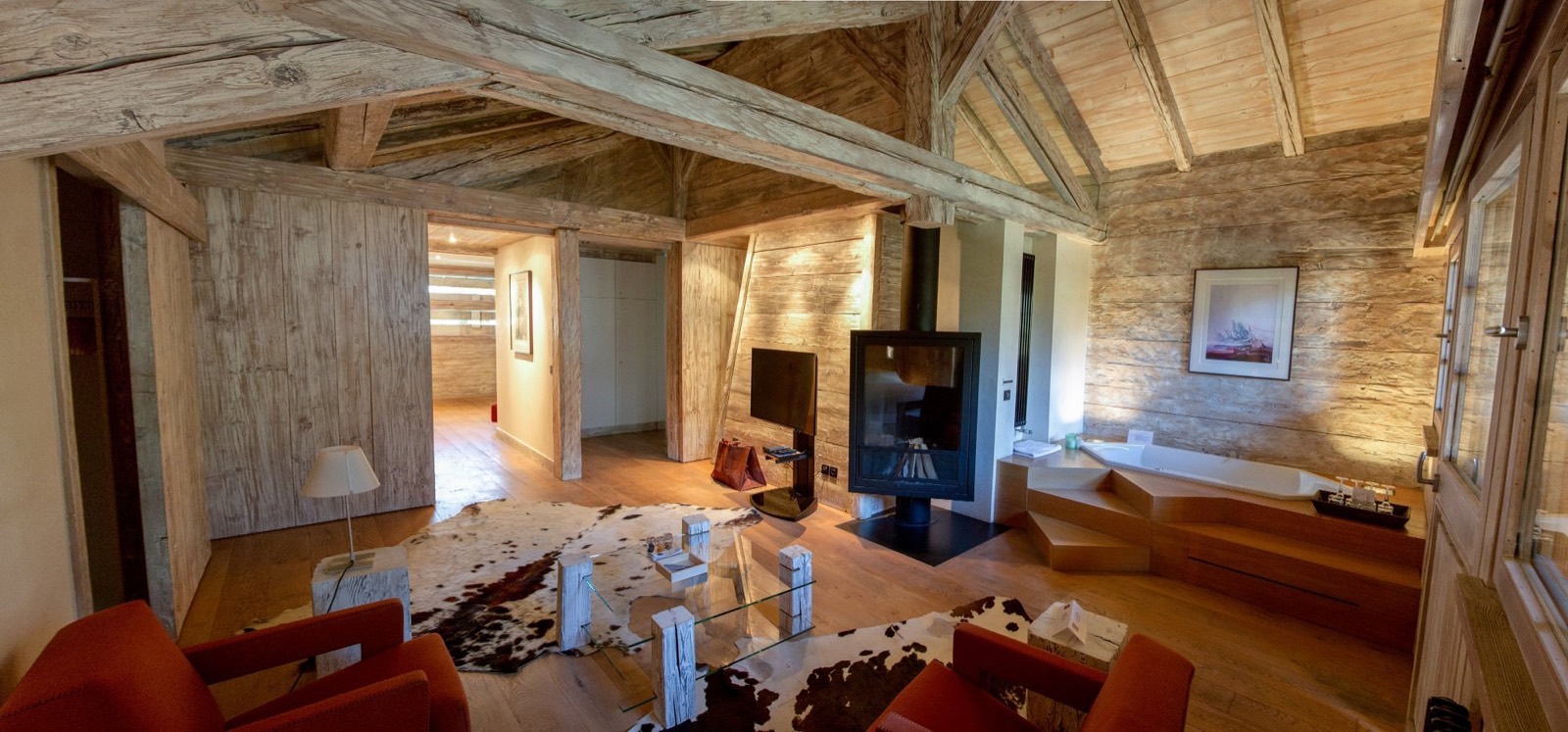 Room with old timber walls and a woodburner
